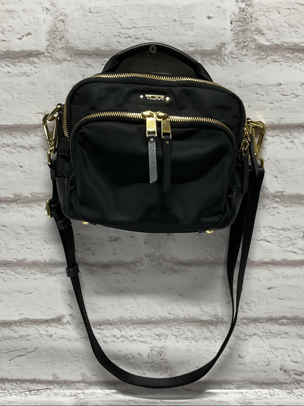 Tumi Black Nylon Crossbody with Gold Hardware Accents